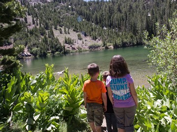 Kids looking at heart lake