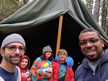 Family in front of tent